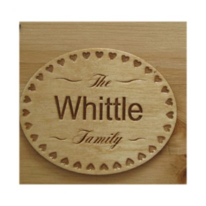 Oval engraved wood nameplate with hearts border
